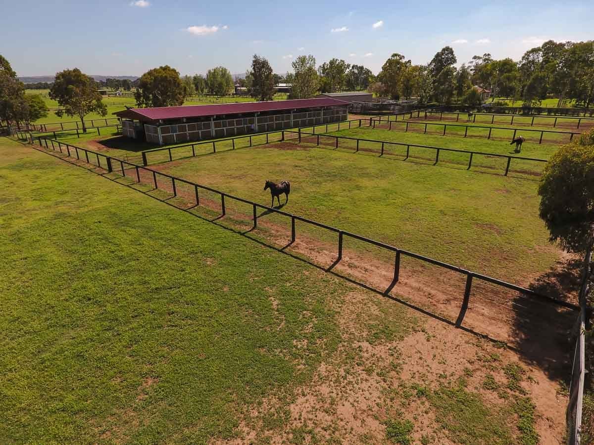 Aerial view of large stables
